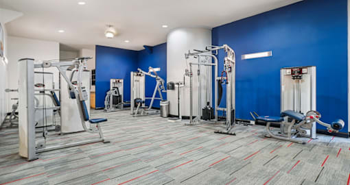 Luxury apartments in north Dallas with fitness center and weight lifting machines at The Saxony Apartments