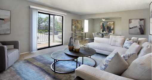 Spacious apartments with lots of natural light, spacious living room, spacious dining room, huge apartment, spacious floor plan, gray wall color at Inwood Apartments in La Vista, Nebraska