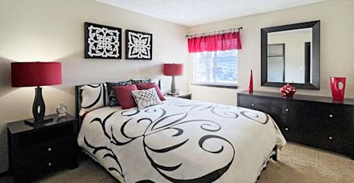 Spacious bedroom with walk-in closet at Kensington Woods Apartments