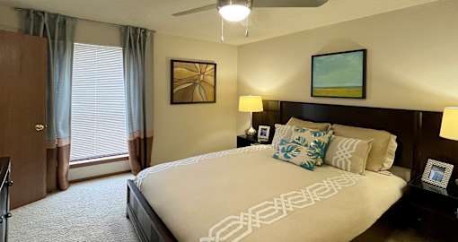 Spacious master bedroom with large walk-in closet at LionsHead Apartments in Omaha Nebraska