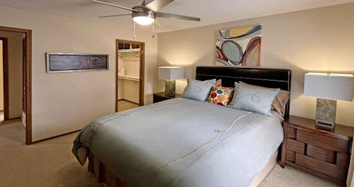 Spacious master bedroom with large walk-in closet at LionsHead Apartments in Omaha Nebraska