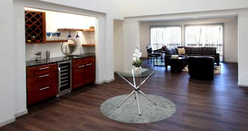 a living room with a table and a couch