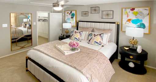 Spacious bedroom that can fit a king size bed with walk-in closet and attached bathroom at Preston Village Apartments in north Dallas