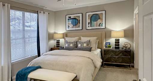 Luxury apartments with spacious bedrooms with attached bathrooms and walk-in closets at Saddlebrook apartments in Urbandale Iowa