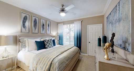 Luxury apartments with spacious bedrooms with attached bathrooms and walk-in closets at The Saxony Apartments