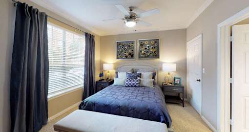 Luxury apartments with spacious bedrooms with attached bathrooms and walk-in closets at The Saxony Apartments