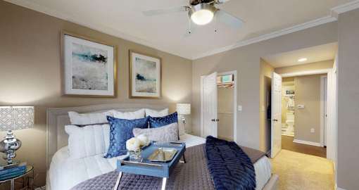 Luxury apartments with spacious bedrooms with attached bathrooms and walk-in closets at The Saxony Apartments