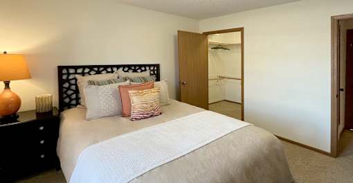 Spacious bedroom with large walk-in closet at Tanglewood Apartments in Lincoln Nebraska