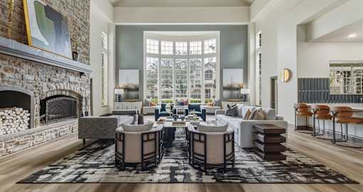 Modern recently remodeled luxury clubhouse and resident lounge space at Village on the Parkway Apartments in Houston Texas