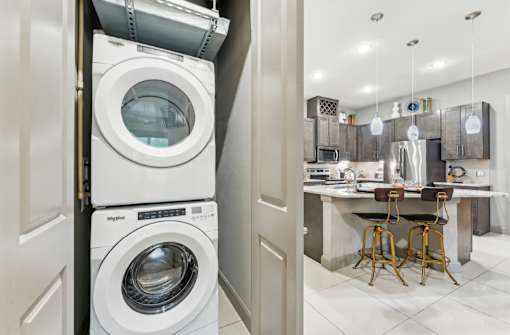Front loading washer and dryer, modern new appliances at Xenia Apartments in Golden Valley Minnesota