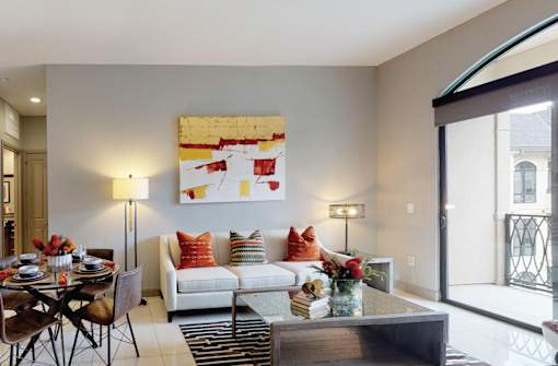 Luxury apartments in River Oaks with spacious living room and 11-foot ceilings at Le Palais Apartments in Houston.