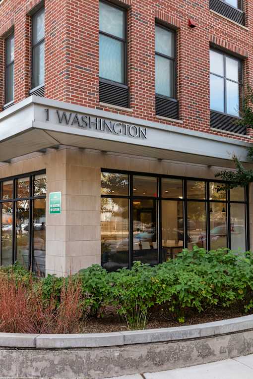 A building with a sign that says "1 Washington".