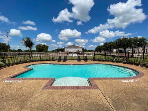 take a dip in the resort style pool at villas at houston levee west apartments