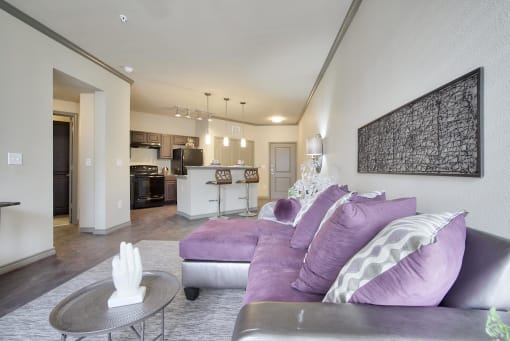 a living room with a couch and a table