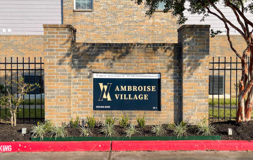 a brick building with a sign on the front of it