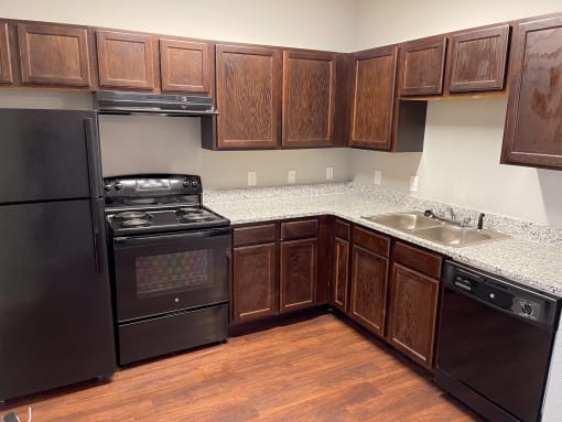 a kitchen at the acadia park apartments in houma, la