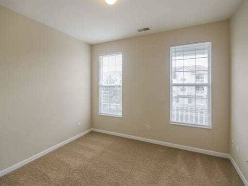 Guest Bedroom at Remington Apartment Homes, Romeoville, IL