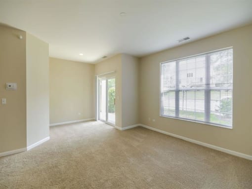 One Bedroom Living Space at Remington Apartment Homes, Romeoville, Illinois