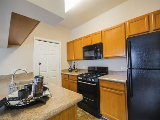 One Bedroom Kitchen at Remington Apartment Homes, Romeoville, IL