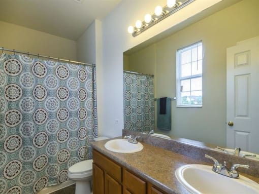 Three Bedroom Master Bathroom at Remington Apartment Homes, Romeoville, Illinois