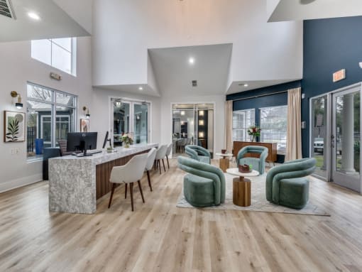 a living room with a bar and chairs and a kitchen  at Vibe on Riverside, Austin, TX, 78741