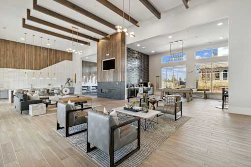 A modern living room with a fireplace and a television.