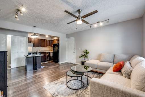 a living room with a couch and a table at Vibe on Riverside, Austin, TX