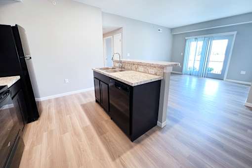 Kitchen with Wooden Floor at Hebron Station Apartments, Hebron, KY