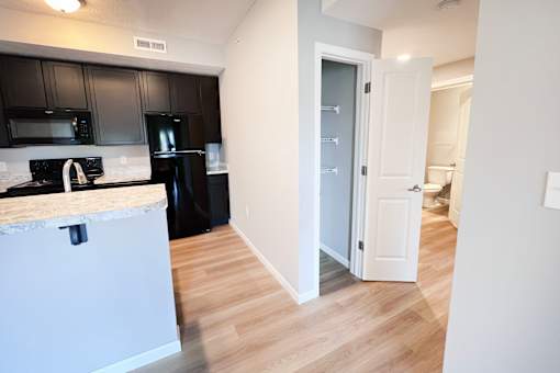 Kitchen with Black Cabinets at Hebron Station Apartments, Kentucky