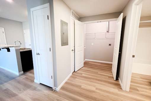 Closet with White Walls at Hebron Station Apartments, Hebron