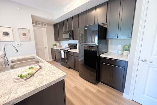 Kitchen with a Marble Countertop at Hebron Station Apartments, Hebron