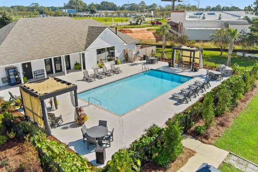 Pool And Exterior View at Baldwin Farms Apartments, Robertsdale, AL, 36567