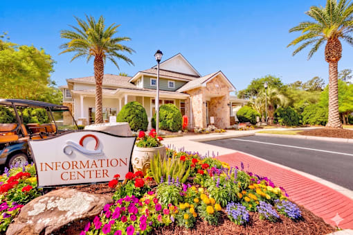 A sign that says Information Center in front of a building.