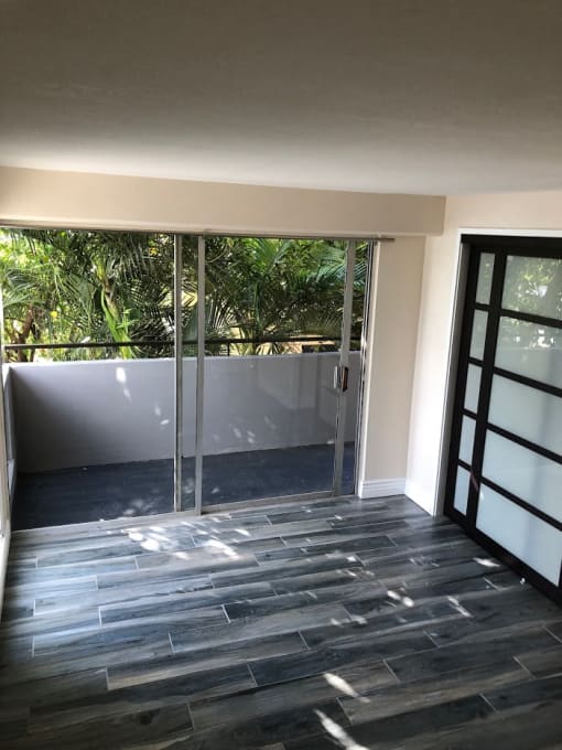 Napili Towers bedroom with closet and glass doors to the balcony