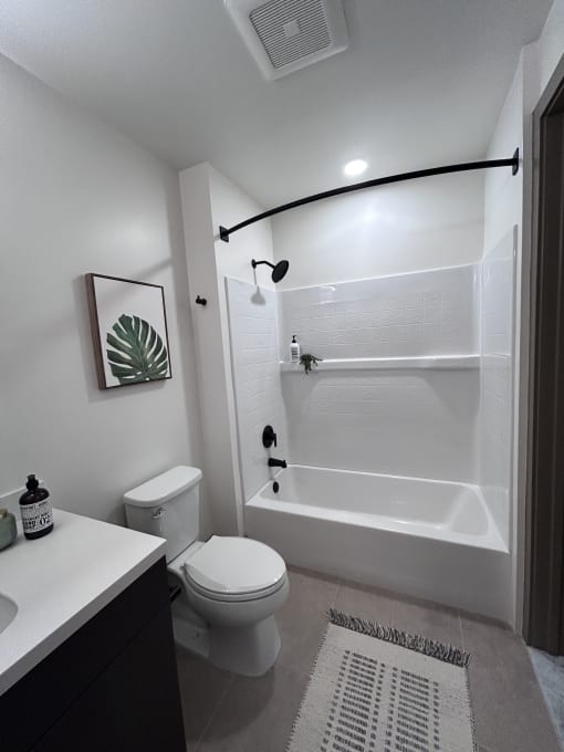 a small bathroom with a sink and a toilet in it