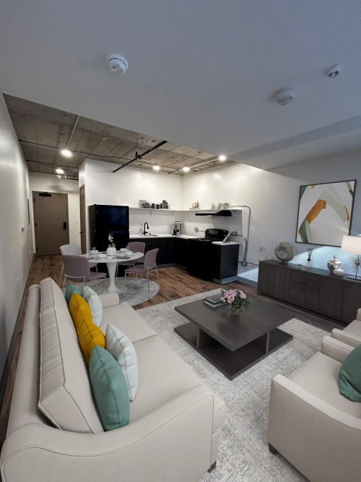 a living room with couches and a coffee table