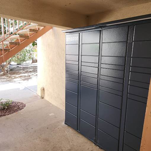 A black Amazon storage unit is closed and locked.