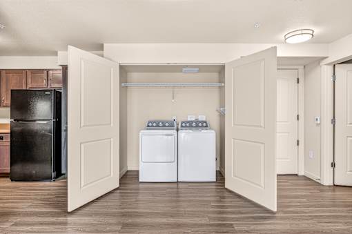 A laundry room with a washer and dryer.