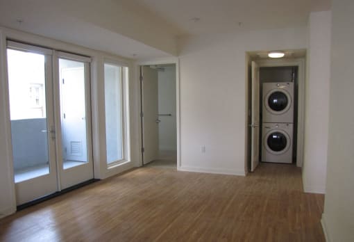 Mayfair Residences living area with washer and dryer