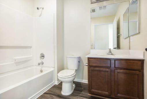 Parkside Villas bathroom vanity, toilet, and shower