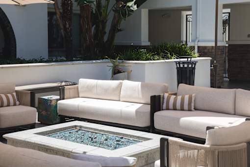 Horizons at Calabasas fire pit surrounded by couches and chairs.