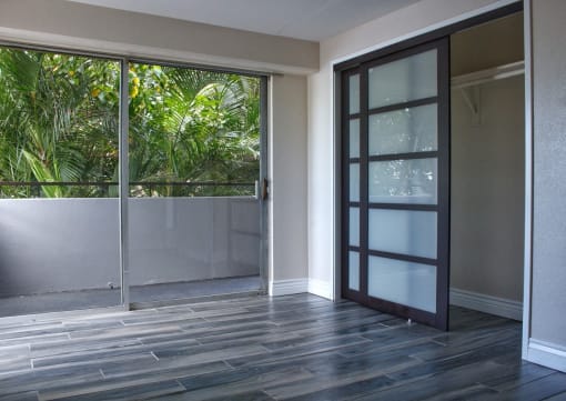 Napili Towers bedroom with closet and glass doors to the balcony