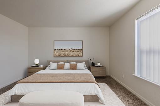 A bedroom with a large bed and a painting on the wall.
