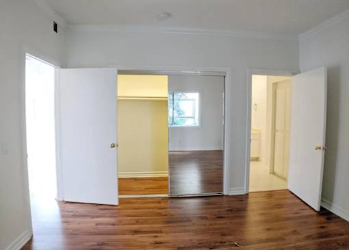 Carmelina Lofts unit 201 primary bedroom