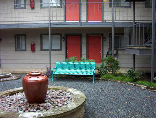 Casa 39 Apartments outdoor common area with fountain