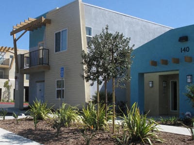El Pedregal Apartments exterior building and planter