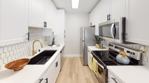 Lyric Apartments kitchen with refrigerator