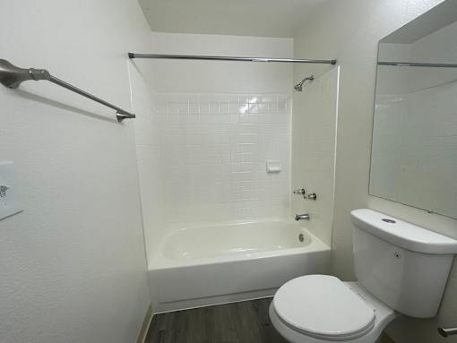 Cluster Park bathroom with toilet and shower.