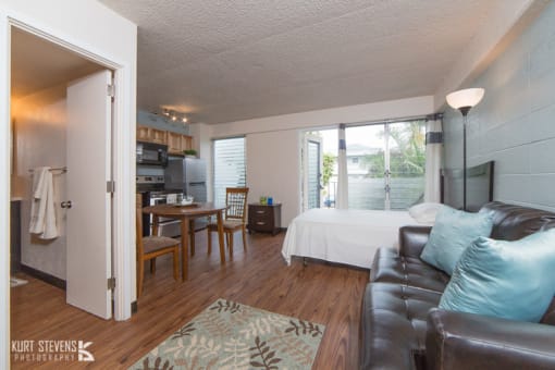 Kewalo Apartments bedroom and living area with decor