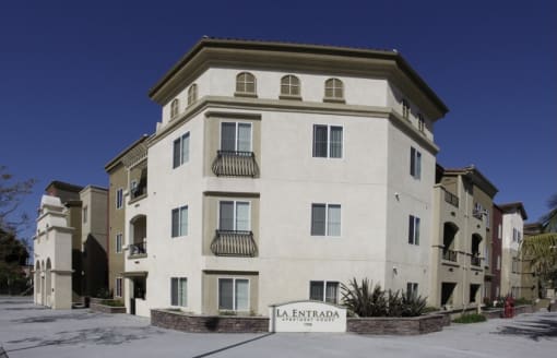 La Entrada exterior with signage